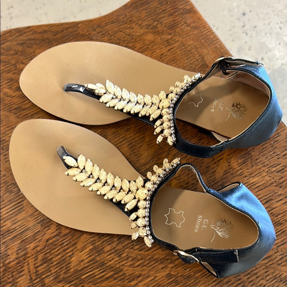 Black and Gold Thong Sandals with Leaf Embellishment